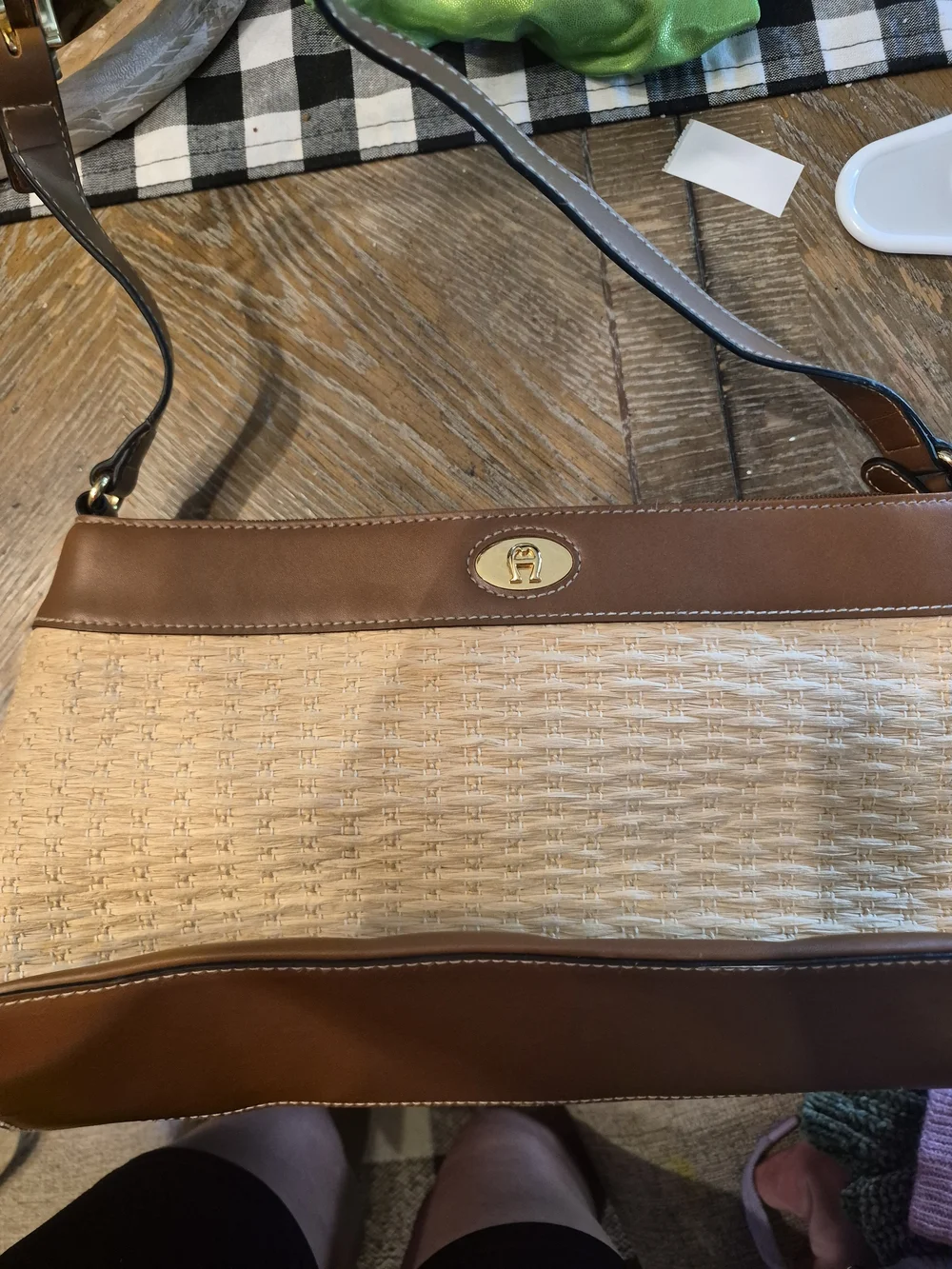 This is a vintage Etienne Aigner basket weave shoulder
